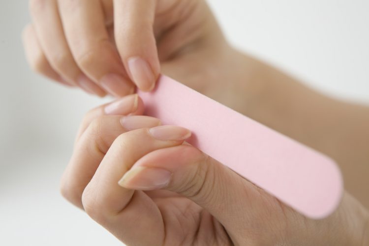 Women cut the nails